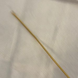 Thin gold stretchy string belt